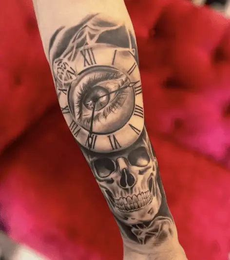 Black and Grey Eye Clock and Skull Arm Tattoo