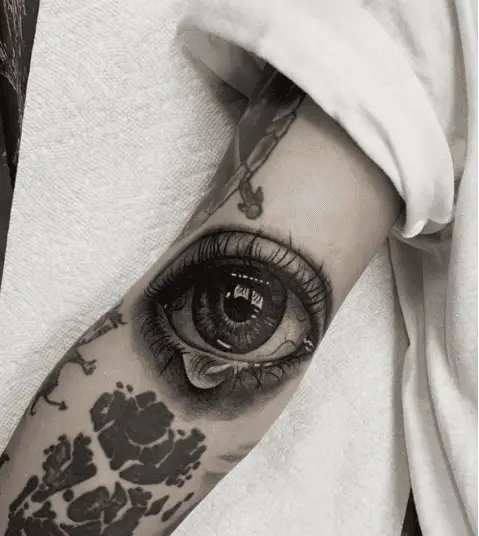 Detailed Big Teary Eye Arm Tattoo