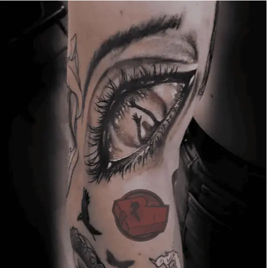 Realistic Silhouette Man in Eye Arm Tattoo