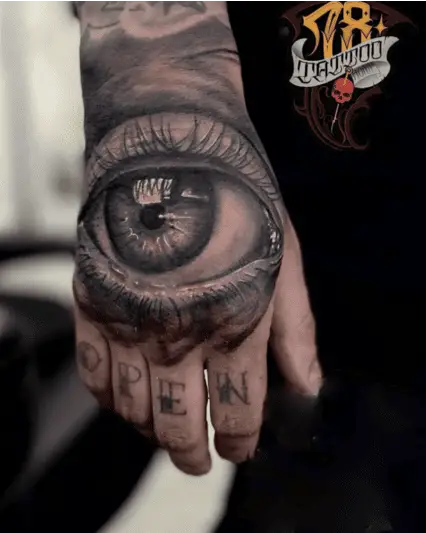 Realistic Big Eye Hand Tattoo