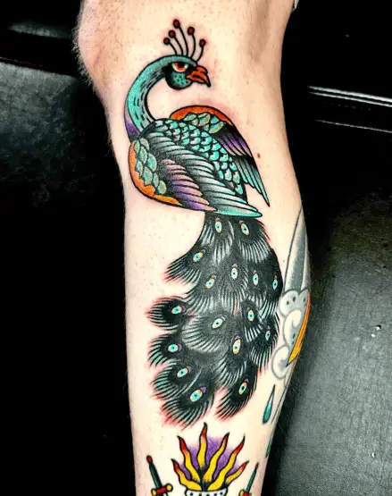 Traditional Ink Peacock Leg Tattoo