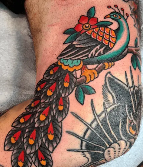 Mixed Colors Traditional Peacock Arm Tattoo