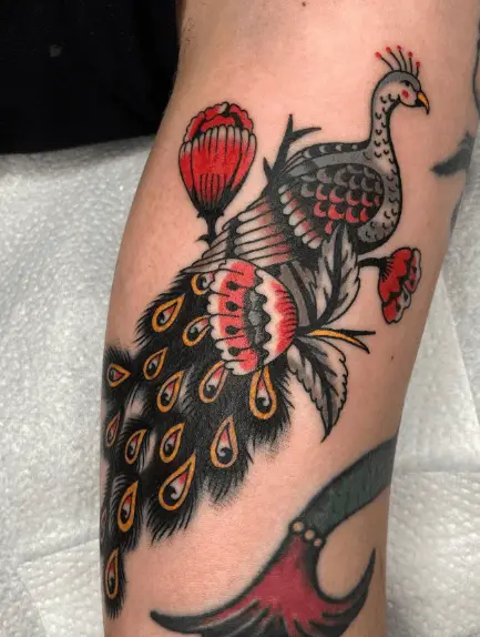 Black and Grey Traditional Peacock with Red Florals Tattoo