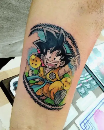 Colored Kid Son Goku in Fun Pose Arm Tattoo