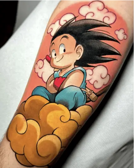 Colored Kid Goku Riding the Flying Nimbus Leg Tattoo