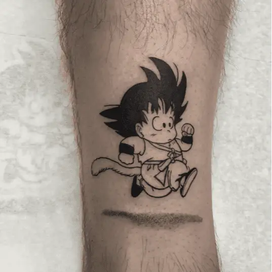 Black Ink Kid Son Goku Running Leg Tattoo