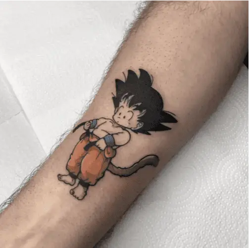 Colored Kid Son Goku Holding His Belt Arm Tattoo