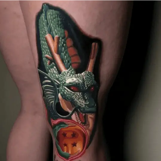 Colored Realistic Shenron Holding the Dragon Ball Thigh Tattoo