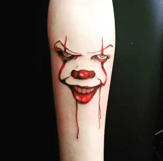 Red Ink Pennywise Face Outline Tattoo