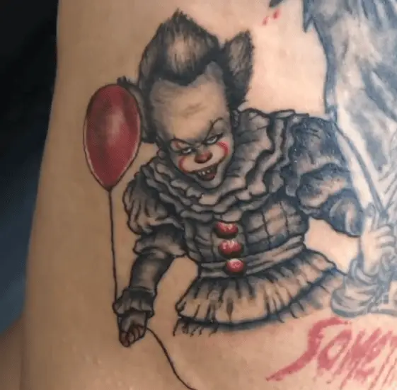 Black and Grey Pennywise Clown with Red Balloon Tattoo