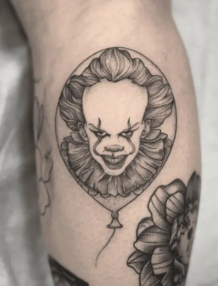 Sketch Style Pennywise Clown Face in a Balloon Tattoo
