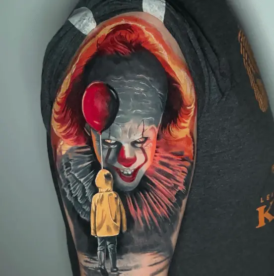 Georgie with Red Balloon and Pennywise Clown Arm Tattoo