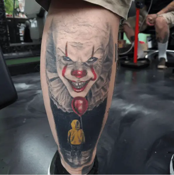 Grayscale Pennywise Clown and Georgie with Red Balloon Colored Tattoo