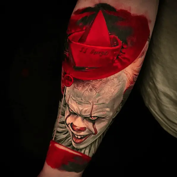 Grayscale Clown and Red Ink Balloon and Paper Boat Tattoo