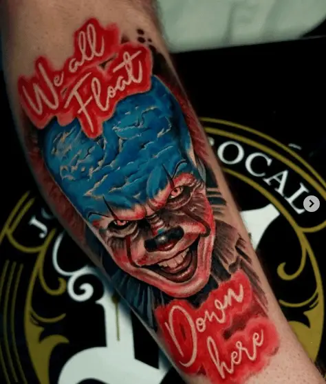 Evil Laugh Clown with Red Ink Lettering Tattoo