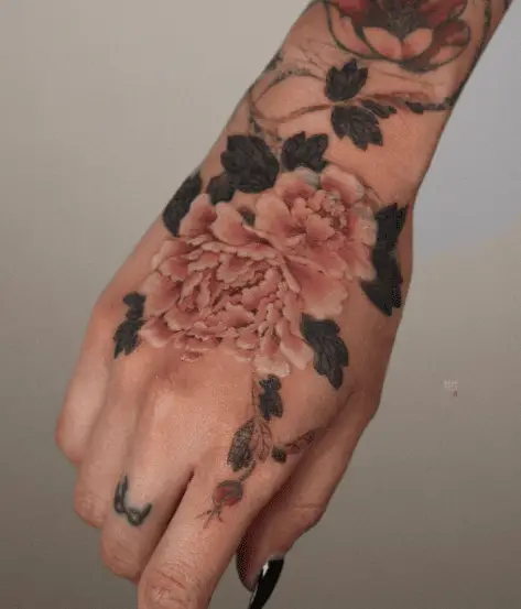 Light Pink Peony Flowers with Black Leaves Hand Tattoo
