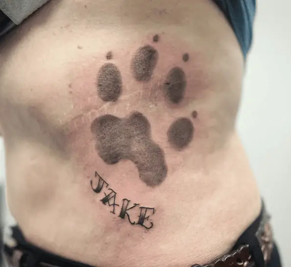 Dog's Paw Print with Name Rib Tattoo