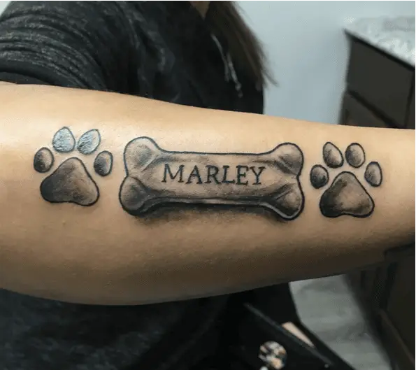 Two Dog Paw Print and a Bone Name Tag Arm Tattoo