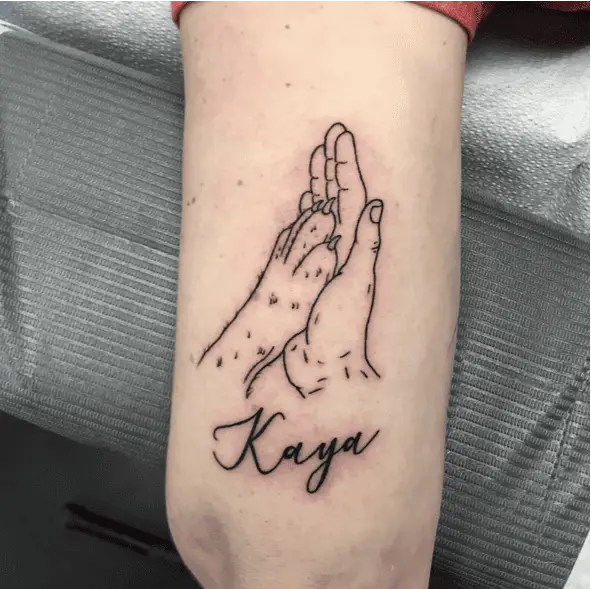 Pet Owner Hand and Dog Paw Holding Each Other Line Work Arm Tattoo