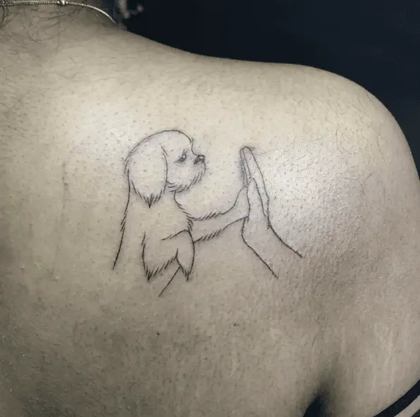 A Puppy High Five Outline Back Tattoo 