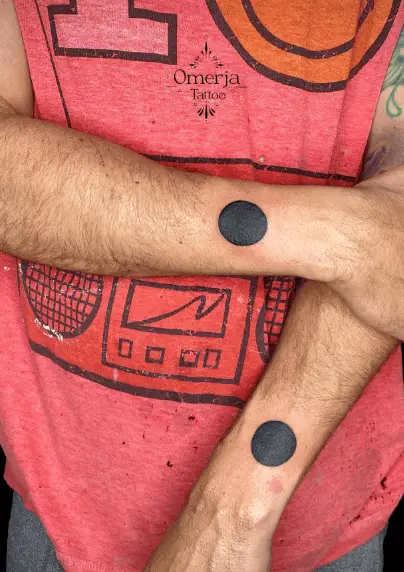 Black Ink Solid Double Circle Hand Tattoo