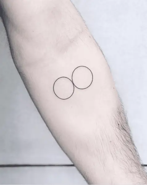 Tiny Black Line Double Circle Tattoo