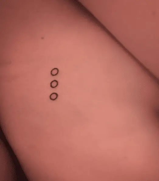 Tiny Triple Circle Tattoo