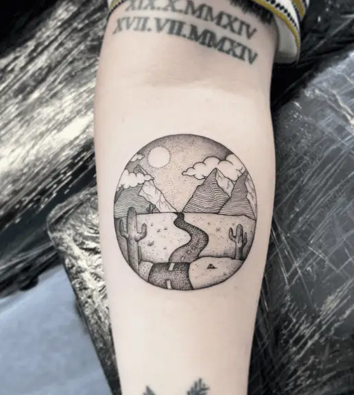 Grayscale Landscape Inside Circle Forearm Tattoo