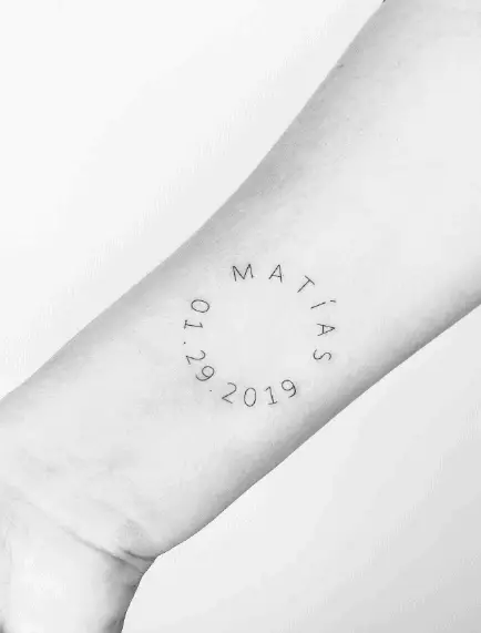 Simple Word with Date Wrist Tattoo