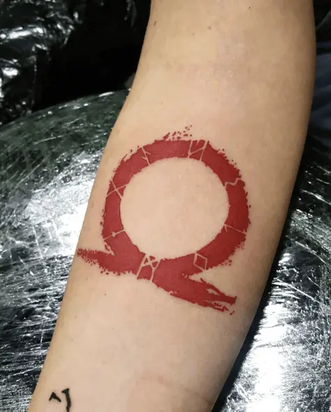 Red Omega Arm Tattoo