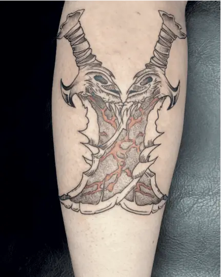 Crossed Blades of Chaos Arm Tattoo