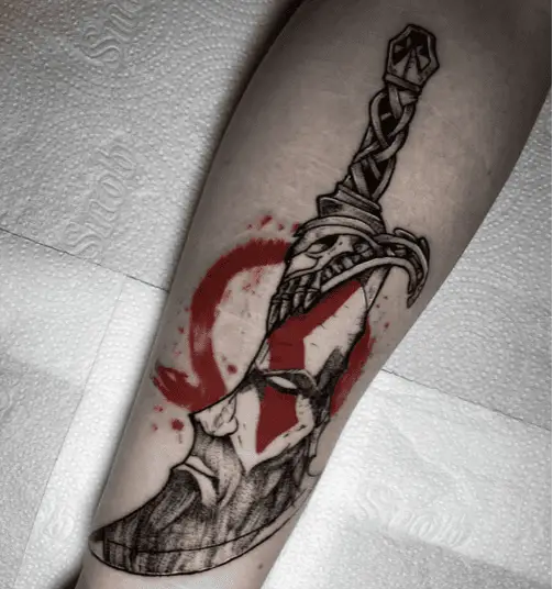 Kratos in Blades of Chaos Arm Tattoo