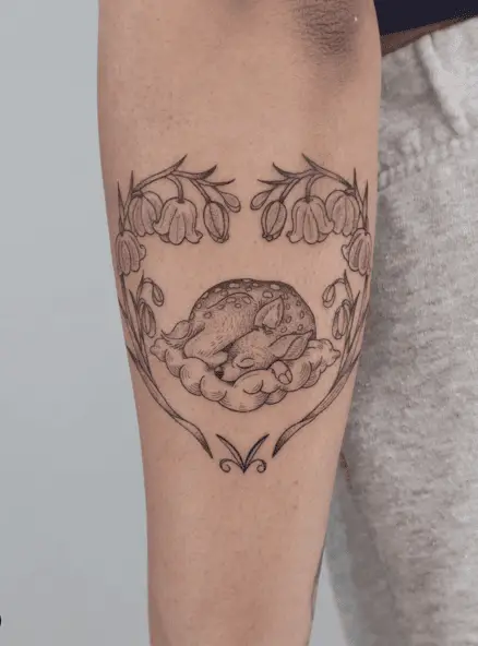 Sleeping Fawn in Heart Lily Flowers Arm Tattoo