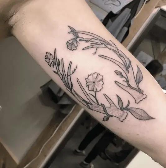 Intertwined Flowers of Deer Antler Upper Arm Tattoo