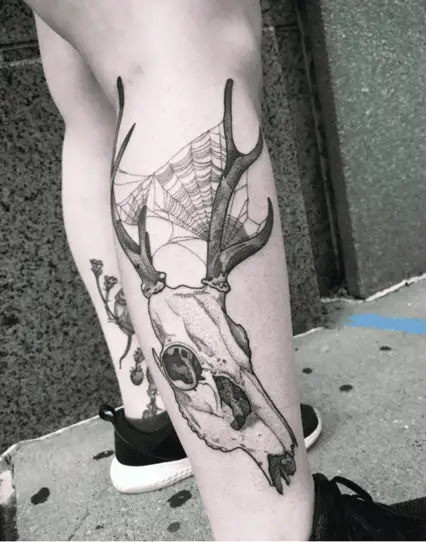 Deer Skull With Spider Web Leg Tattoo