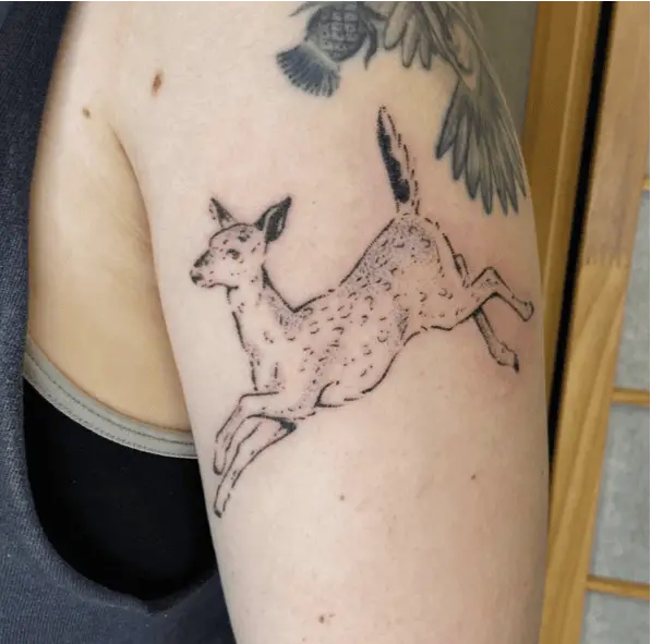 Leaping White Female Deer Upper Arm Tattoo