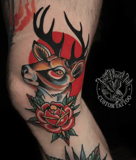 Traditional Deer With a Flower Knee Tattoo