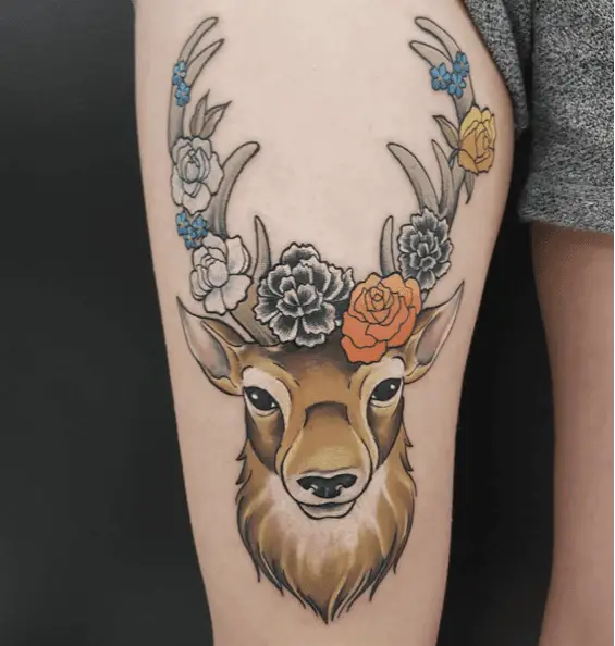 Different Flowers in Deer Antlers Colored Thigh Tattoo
