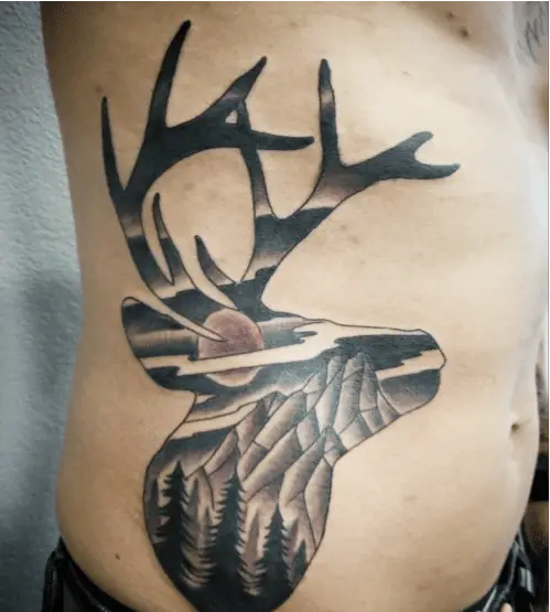 Mountain and Forest in Deer Rib Tattoo