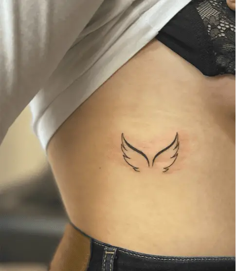 Fine Line Angel Wings Rib Tattoo