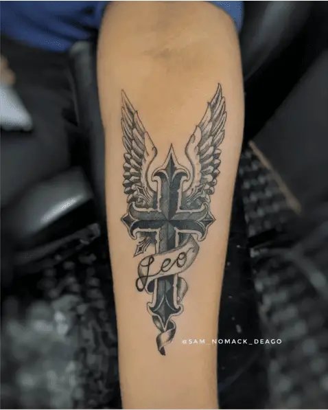 Cross And Angel Wing With Name Banner Arm Tattoo