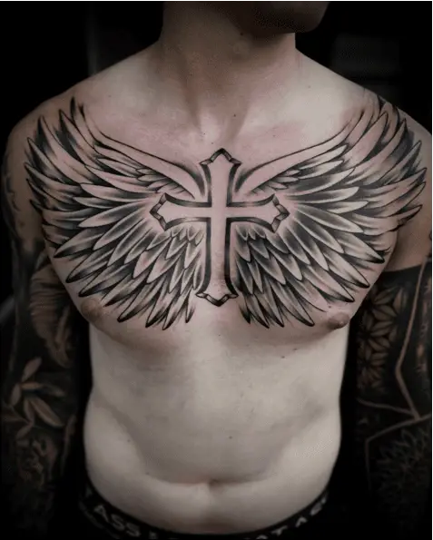 Glowing Cross And Angel Wing Full Upper Chest Tattoo