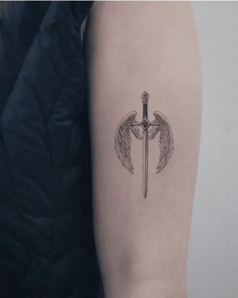 Small Detailed Sword And Angel Wing Arm Tattoo