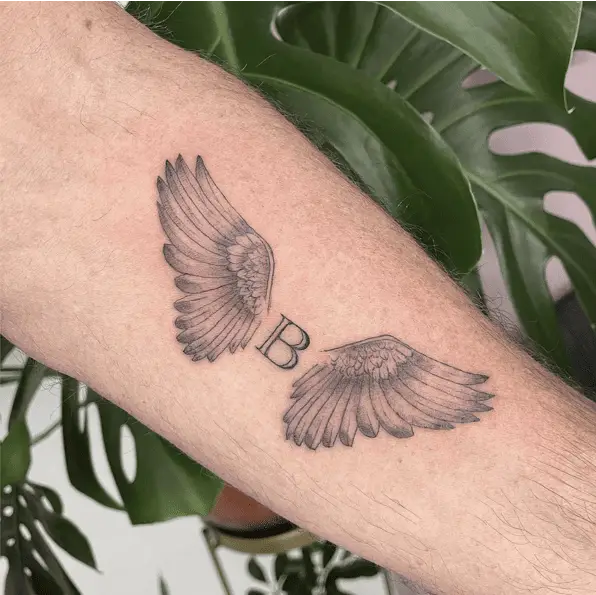 Initial Letter Memorial Angel Wing Arm Tattoo