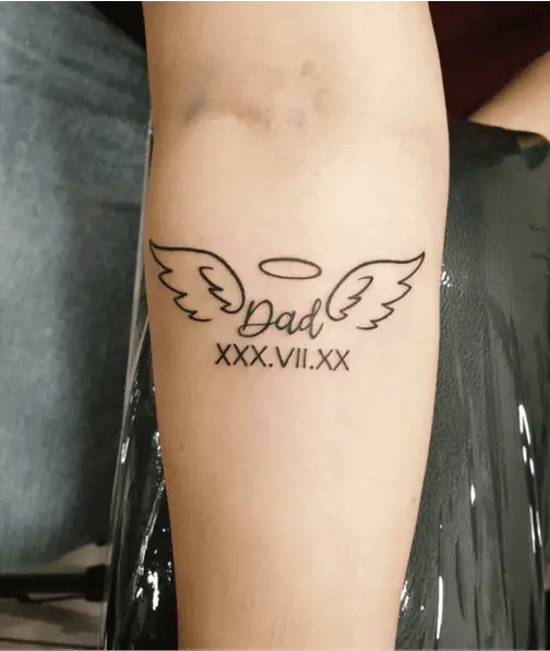 Simple Memorial Angel Wing With Roman Numerals Date Arm Tattoo