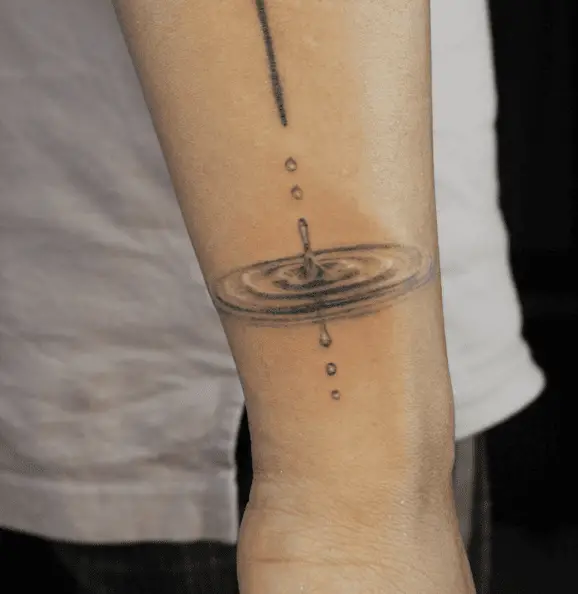 Water Drop Ripple Effect Arm Tattoo