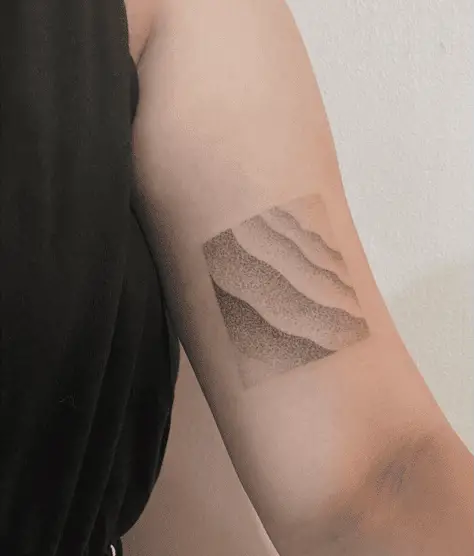 Dotted Ripple Waves Arm Tattoo