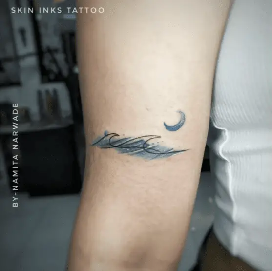 Blue Waves and Moon Arm Tattoo