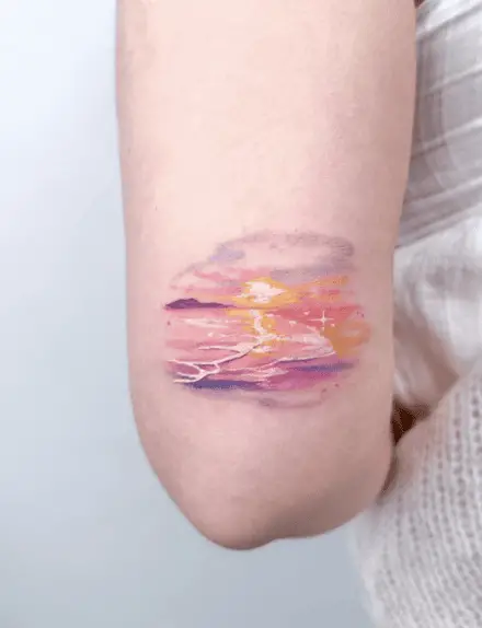 Pink Ocean Sunset Arm Tattoo