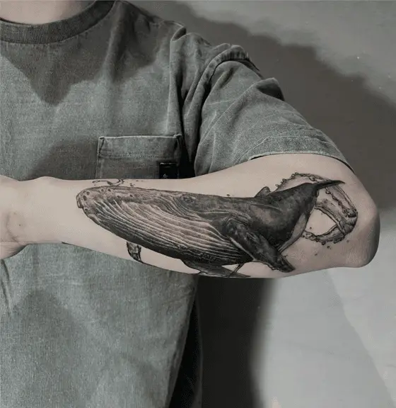 Majestic Whale in the Ocean Arm Tattoo